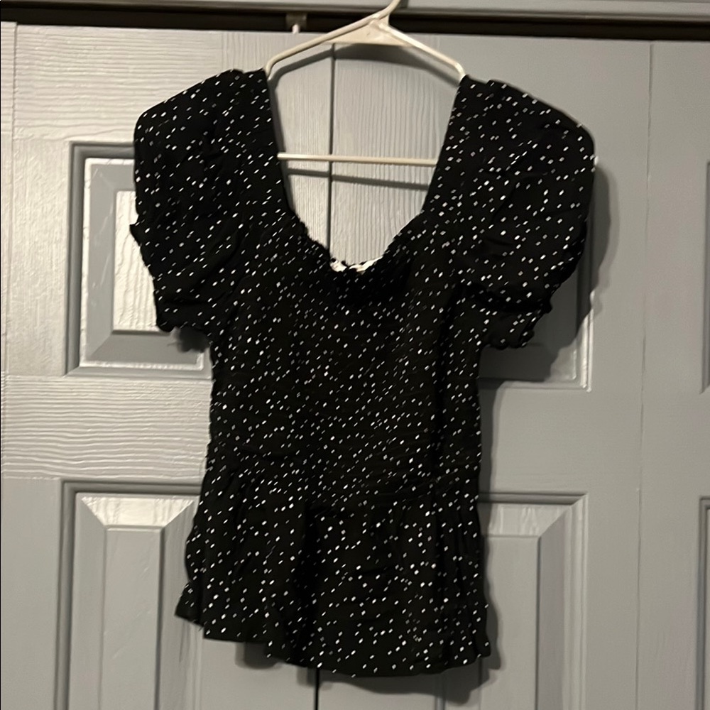 Black and white polka dot blouse